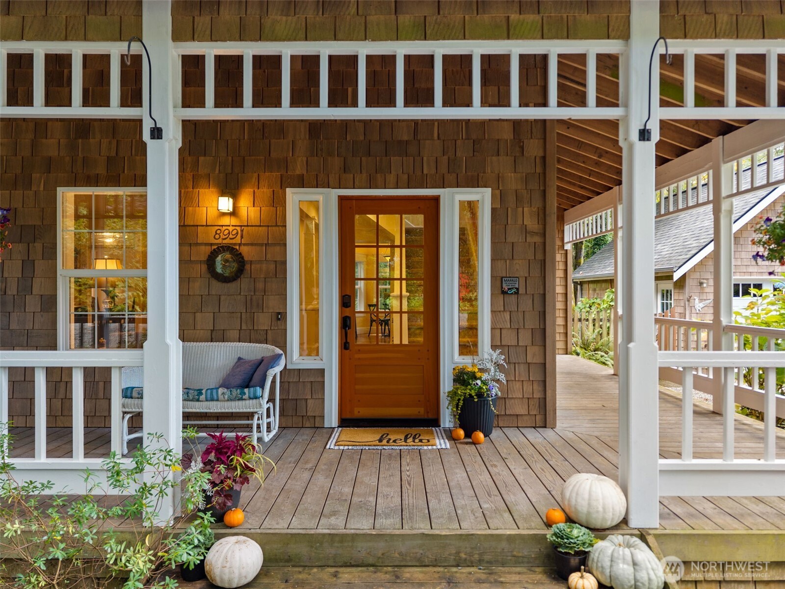 8991 Springwood Avenue Northeast Bainbridge Island, WA 98110 - Photo 10 of 36 a view of a house with sitting area