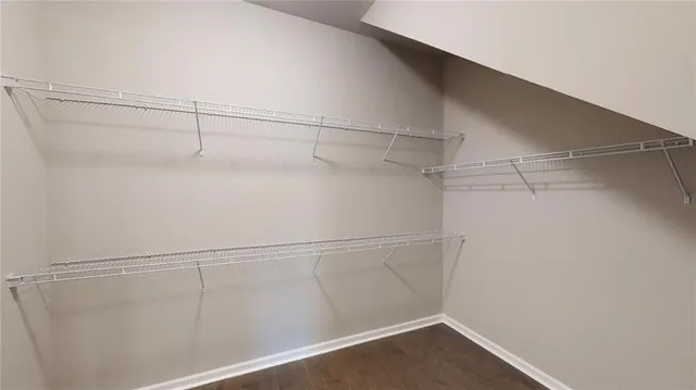 a view of a room with racks on the wall