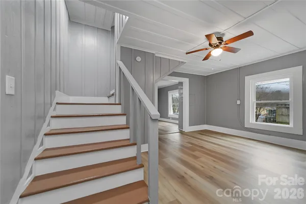 a view of an empty room with a window