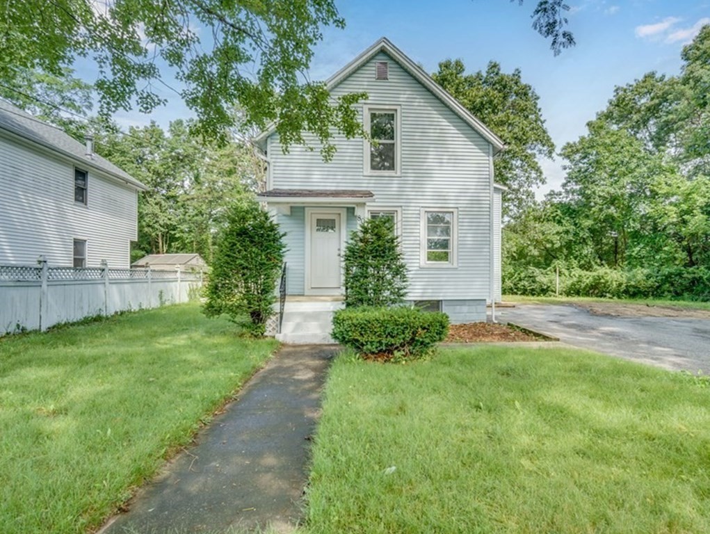 80 Brickett Street Springfield, MA 01119 - Photo 1 of 30 a front view of house with yard and green space