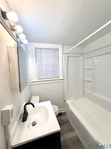 a bathroom with a sink and a bathtub