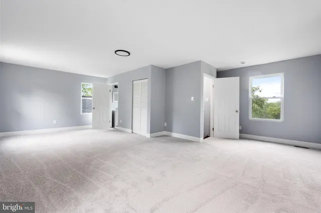 a view of empty room with front door