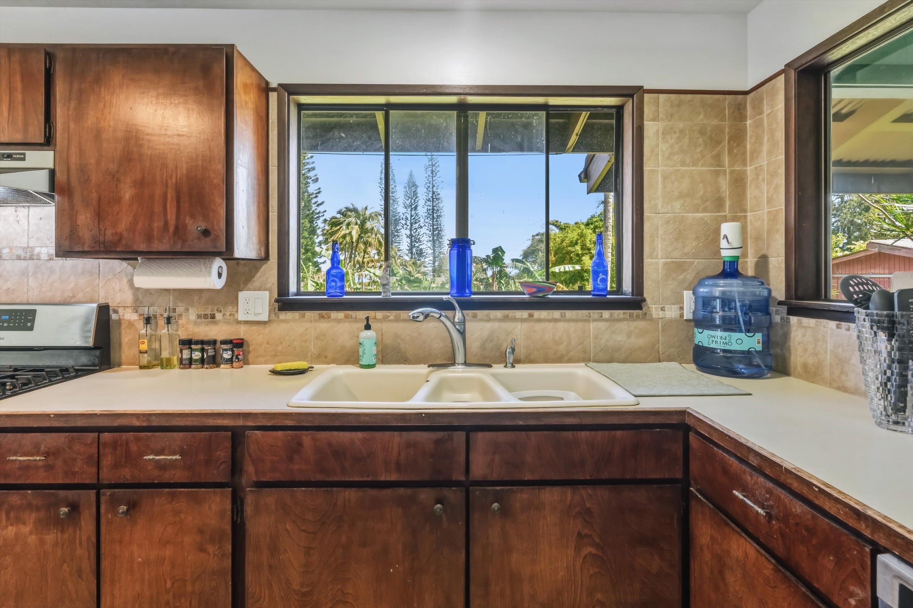 145 South Holokai Road Haiku, HI 96708 - Photo 30 of 50 a bathroom with a sink and a mirror