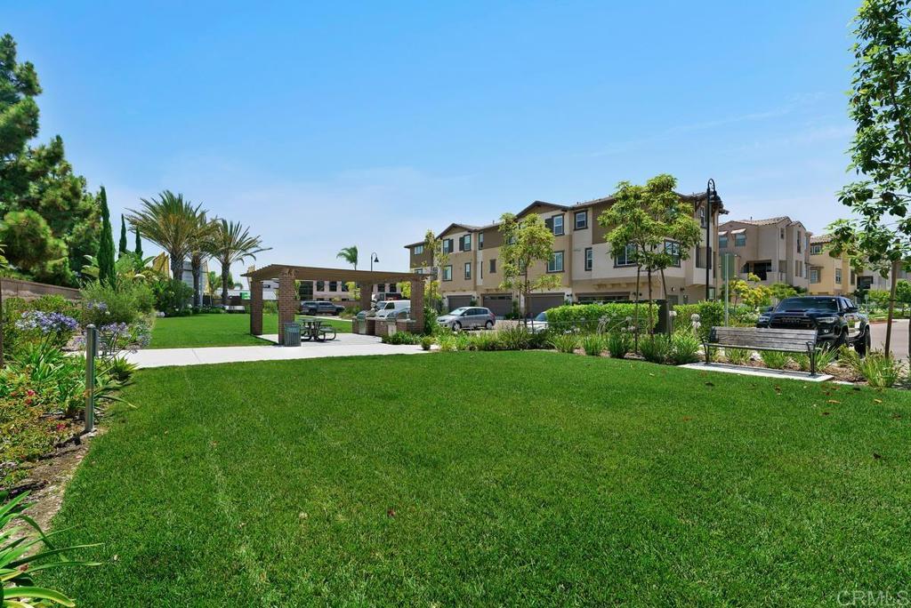 1167 Via Lucero Oceanside, CA 92056 - Photo 49 of 54 a view of a house with a big yard