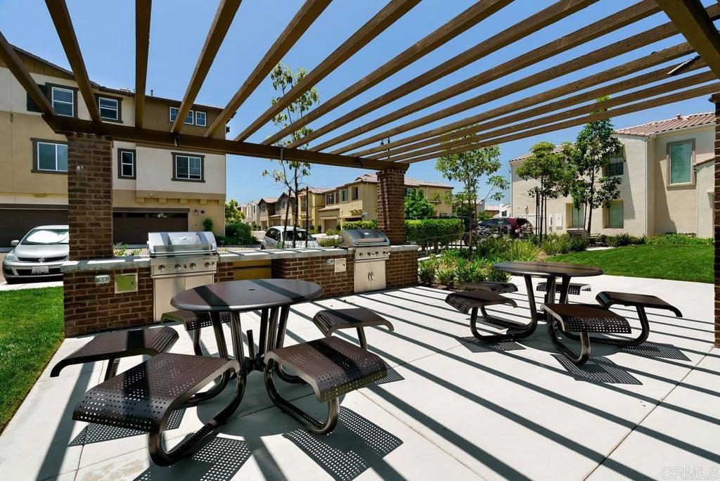 1167 Via Lucero Oceanside, CA 92056 - Photo 50 of 54 a view of a patio with chairs and tables