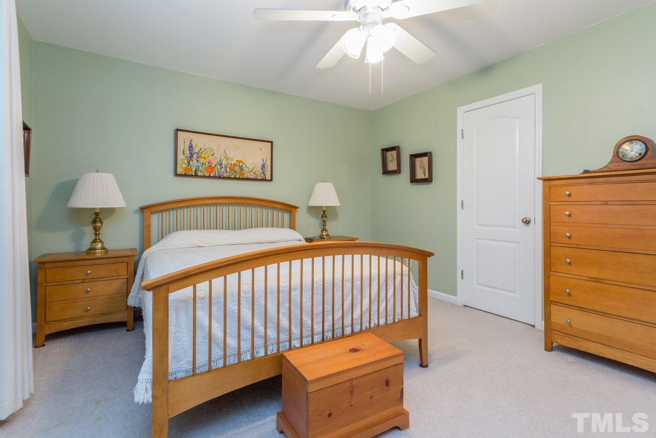 3406 Cathedral Bell Road Raleigh, NC 27614 - Photo 18 of 25 a bedroom with a bed and a view of bedroom
