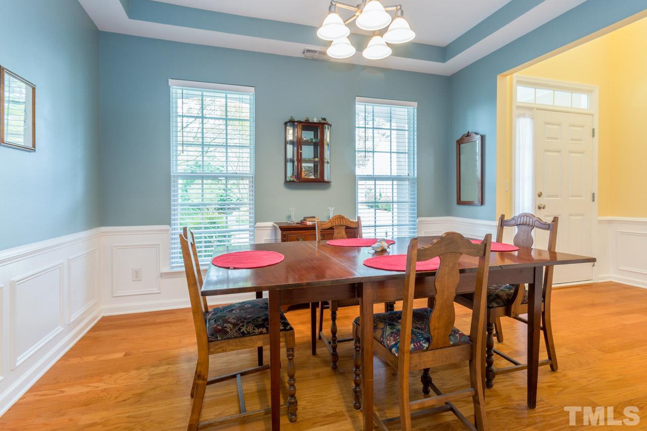 3406 Cathedral Bell Road Raleigh, NC 27614 - Photo 3 of 25 a view of a dining room with furniture and window