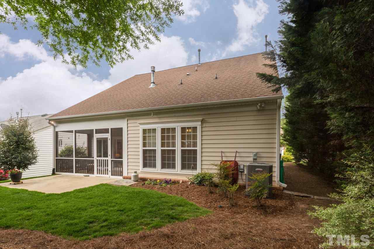 3406 Cathedral Bell Road Raleigh, NC 27614 - Photo 23 of 25 front view of a house with a yard