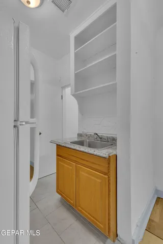 a bathroom with a toilet and a sink