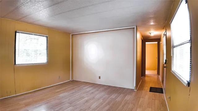 an empty room with windows
