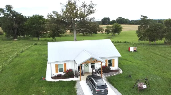 a aerial view of a house with garden