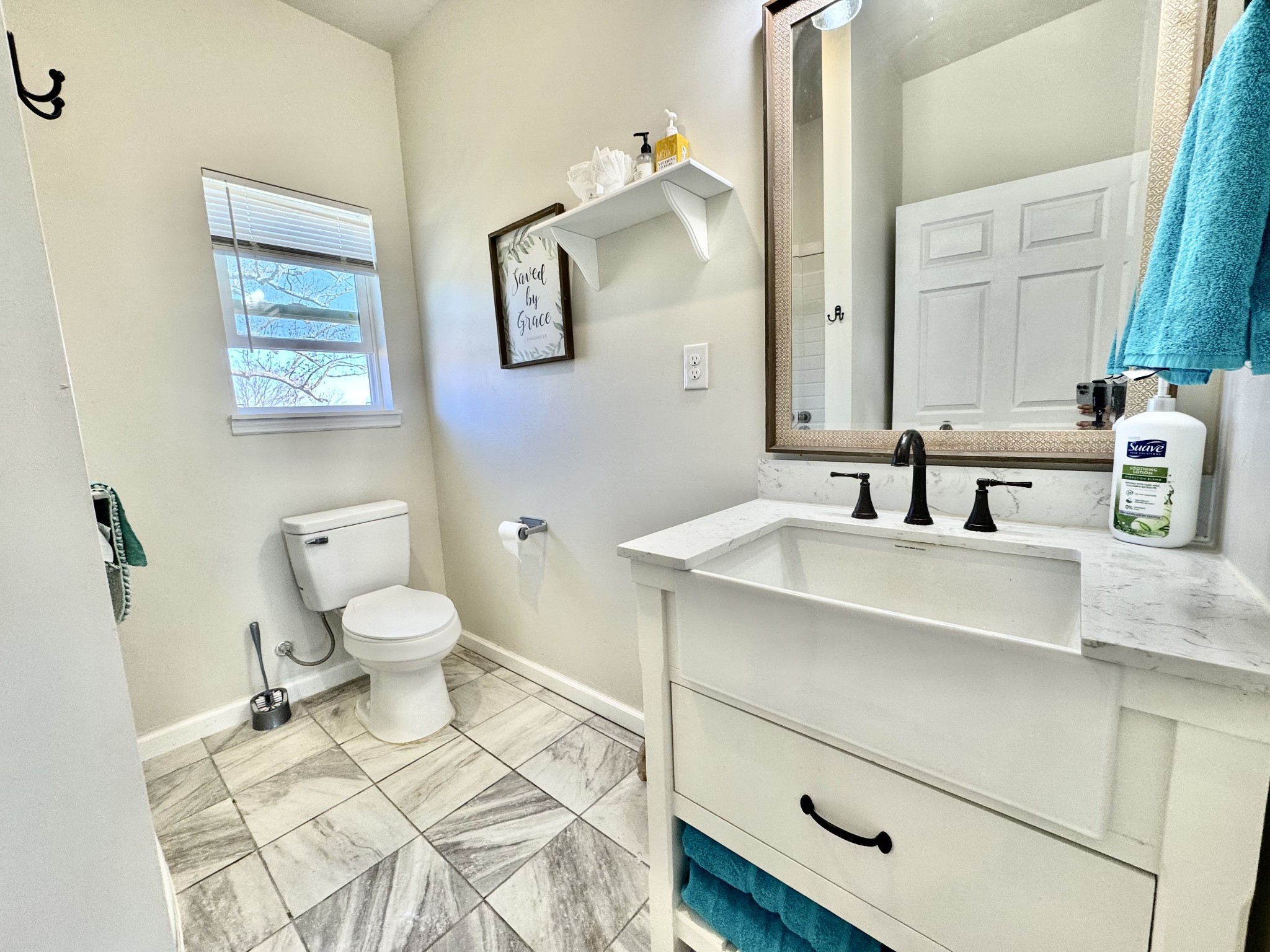 11250 Shelbyville Road Morrison, TN 37357 - Photo 25 of 33 a bathroom with a sink toilet and mirror