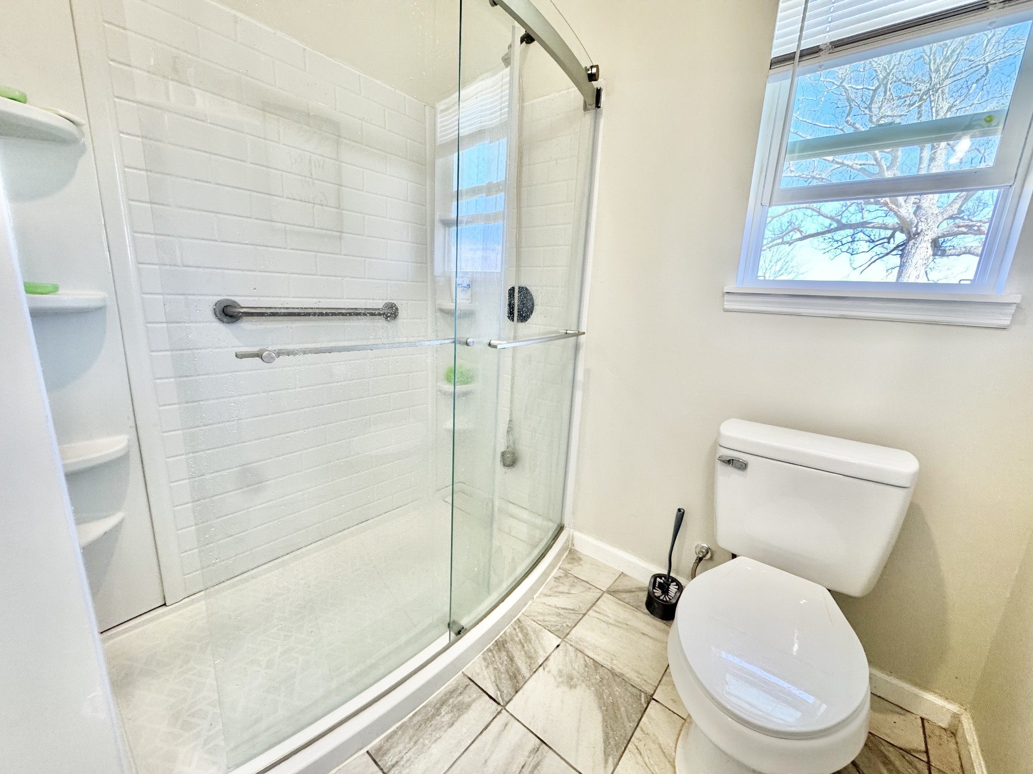 11250 Shelbyville Road Morrison, TN 37357 - Photo 26 of 33 a white toilet sitting next to a bath tub shower
