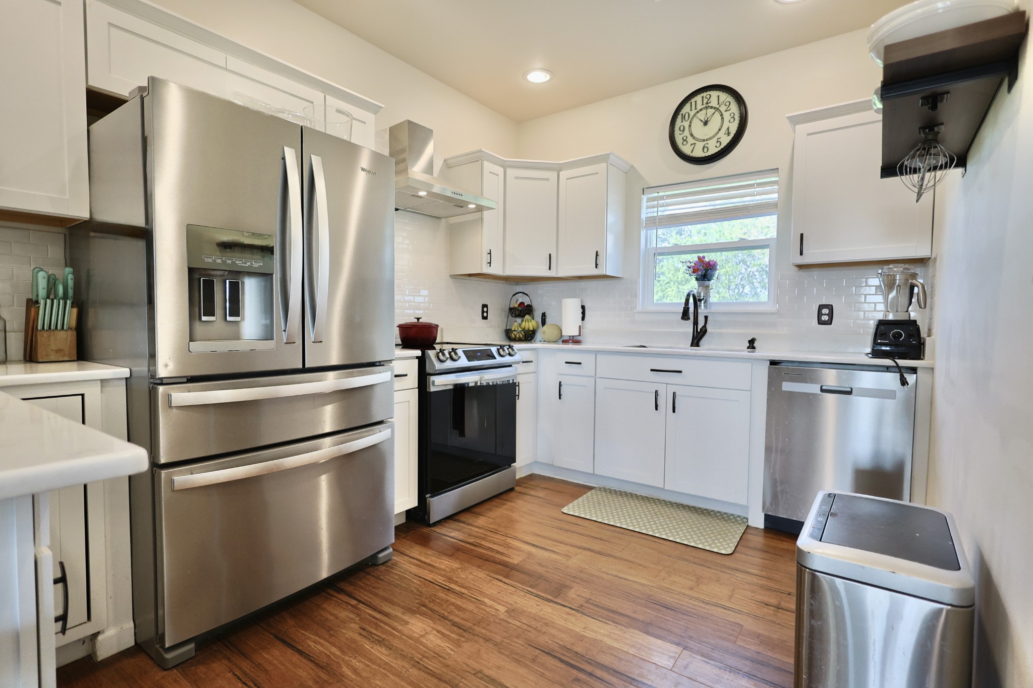 11250 Shelbyville Road Morrison, TN 37357 - Photo 4 of 33 a kitchen with a sink cabinets stainless steel appliances and wooden floor