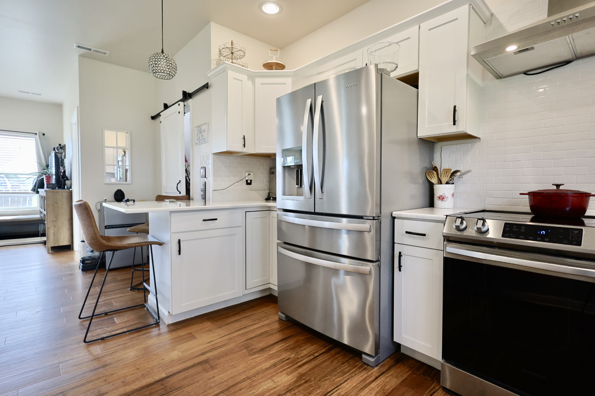 11250 Shelbyville Road Morrison, TN 37357 - Photo 5 of 33 a kitchen with wooden floors and appliances