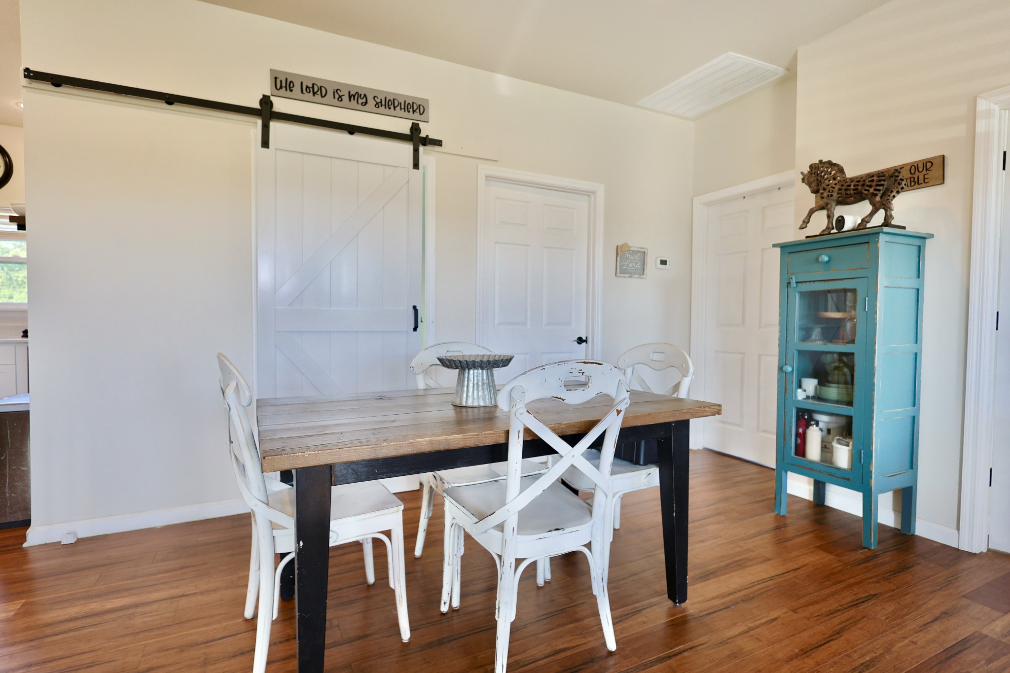 11250 Shelbyville Road Morrison, TN 37357 - Photo 6 of 33 a view of a dining room with furniture and wooden floor