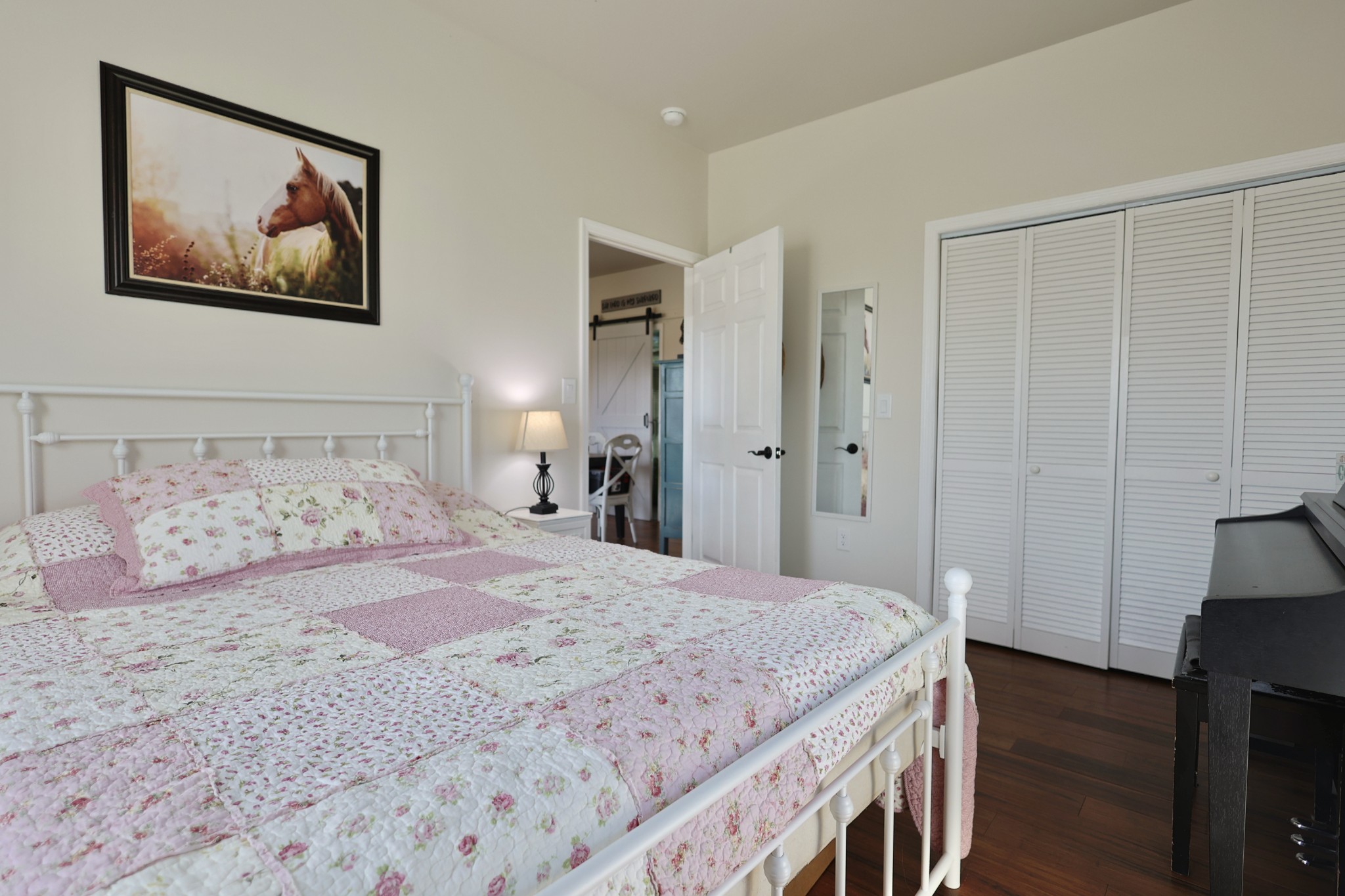 11250 Shelbyville Road Morrison, TN 37357 - Photo 8 of 33 a bedroom with a bed and a painting on the wall