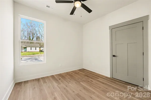 a view of an empty room and window