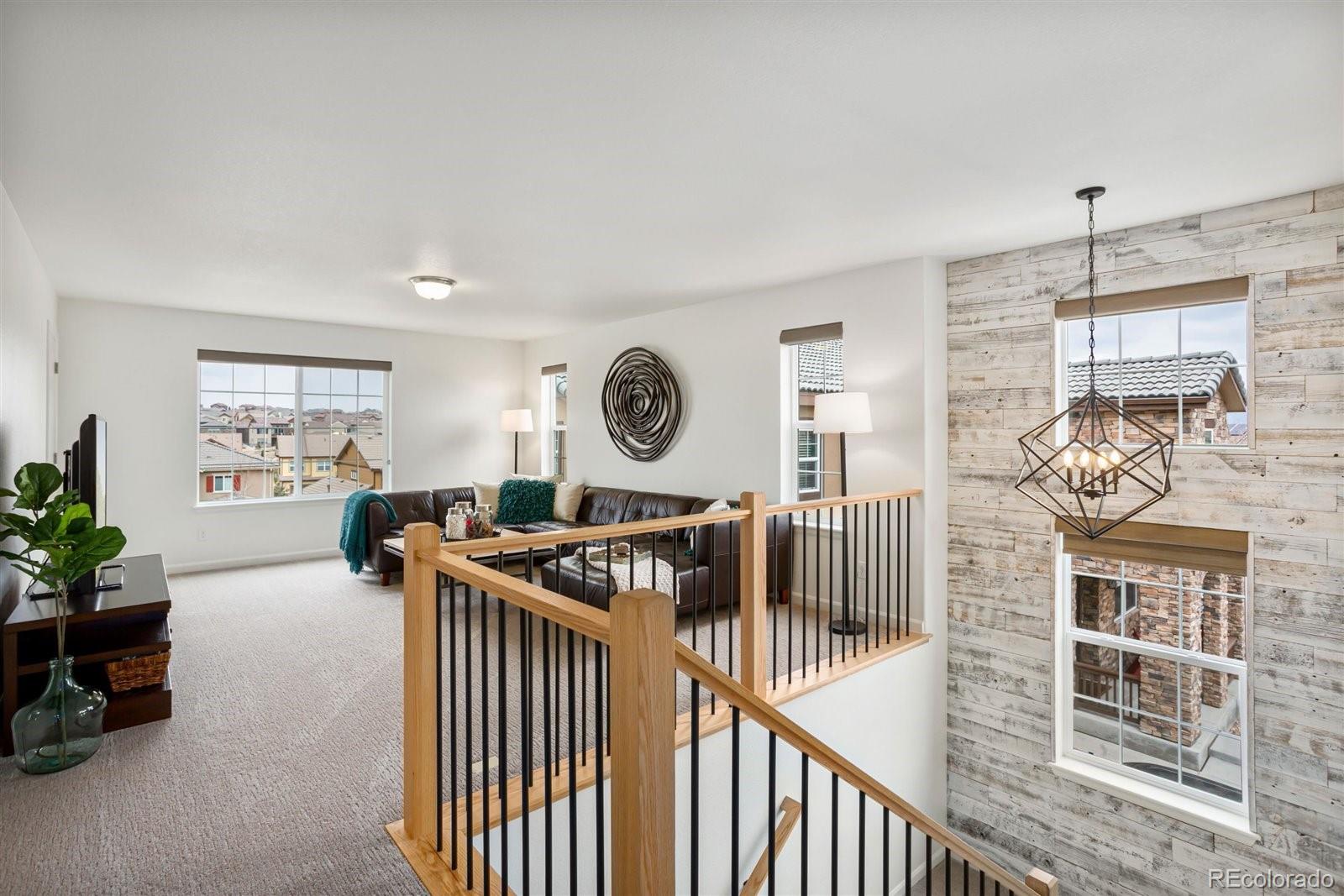 690 Tiger Lily Way Highlands Ranch, CO 80126 - Photo 11 of 38 a view of a livingroom with furniture and window