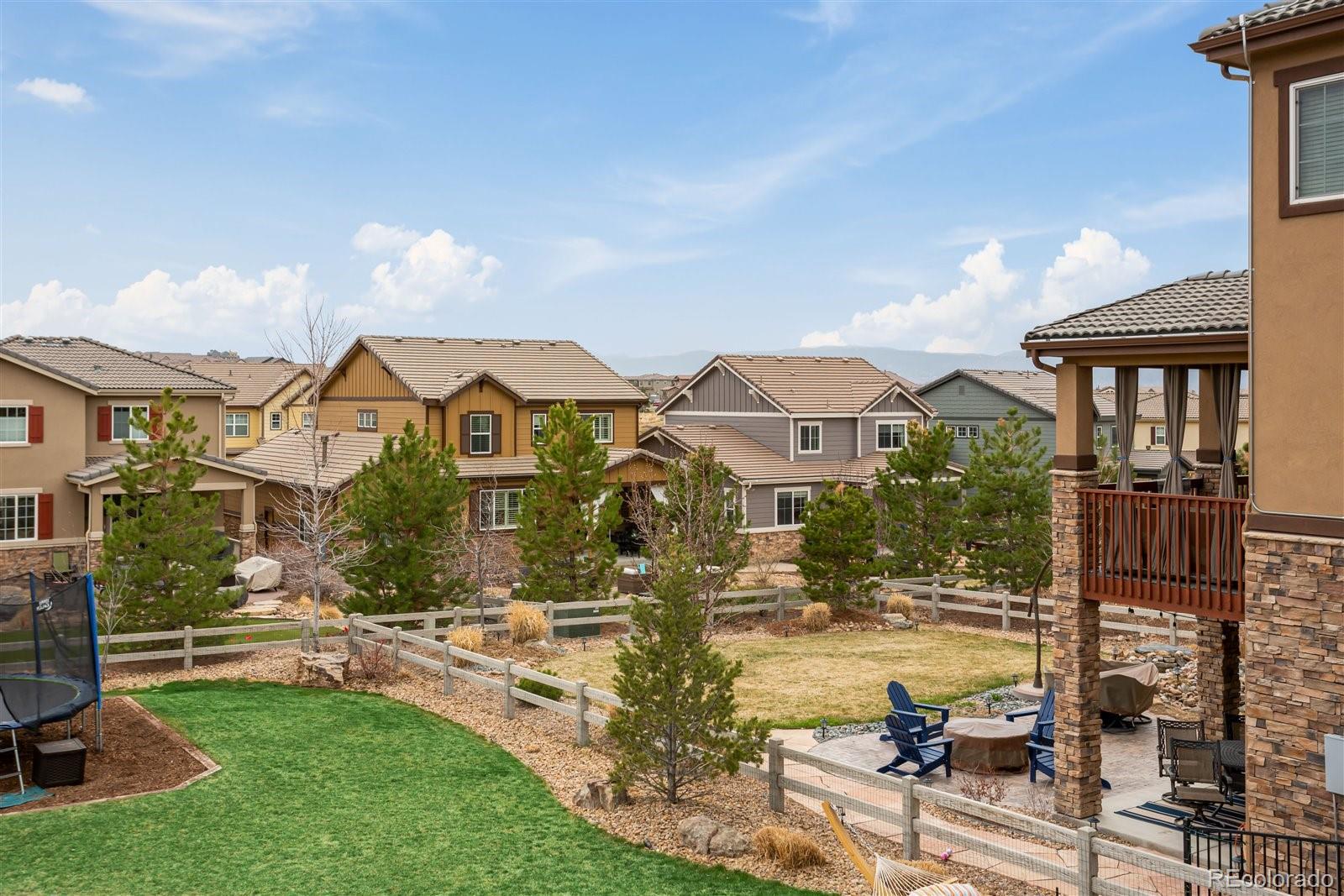 690 Tiger Lily Way Highlands Ranch, CO 80126 - Photo 33 of 38 a front view of a house with garden