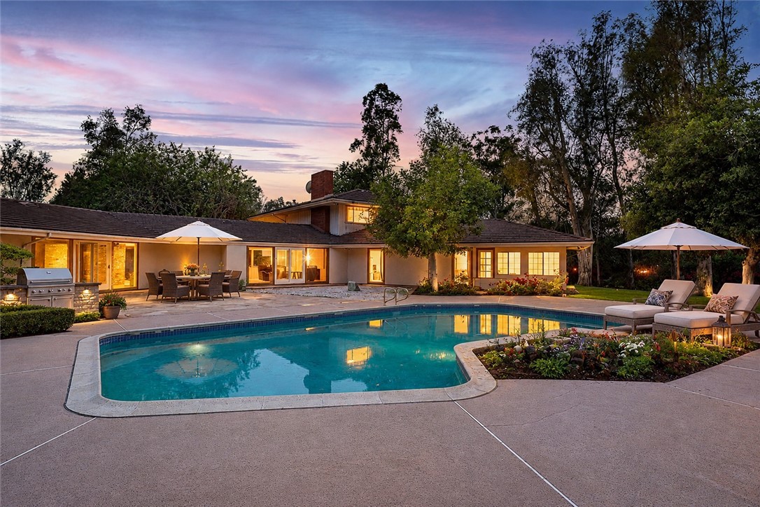 20827 East Mesarica Road Covina, CA 91724 - Photo 3 of 3 a view of a house with a yard patio and swimming pool
