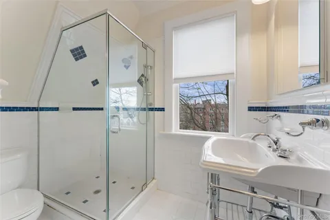 a bathroom with a bathtub and a sink
