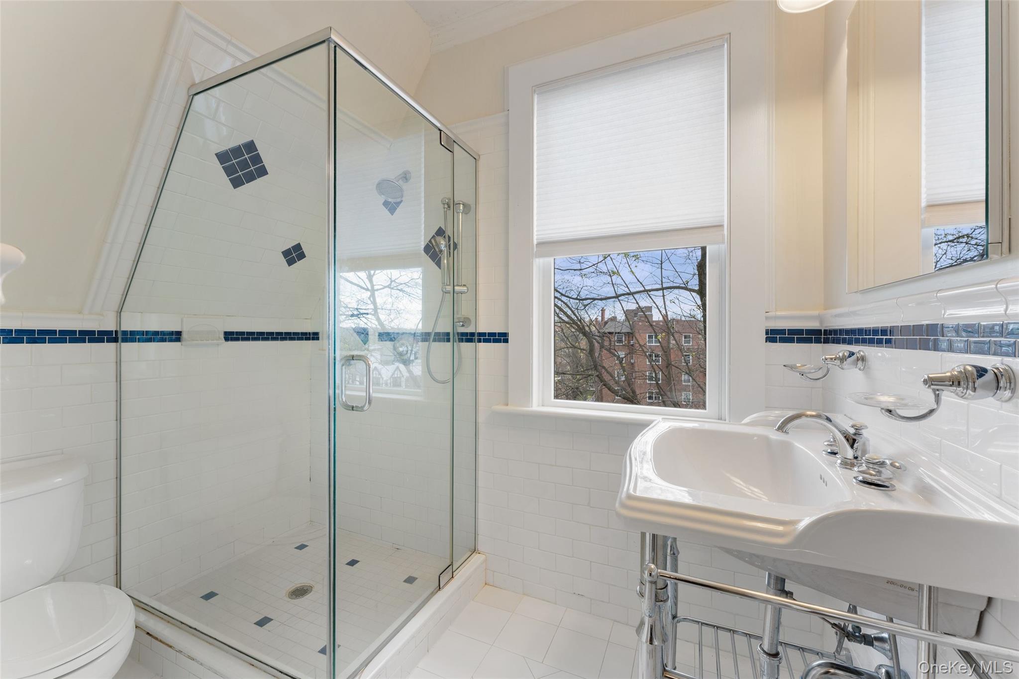25 Merriam Avenue Bronxville, NY 10708 - Photo 16 of 26 a bathroom with a bathtub and a sink