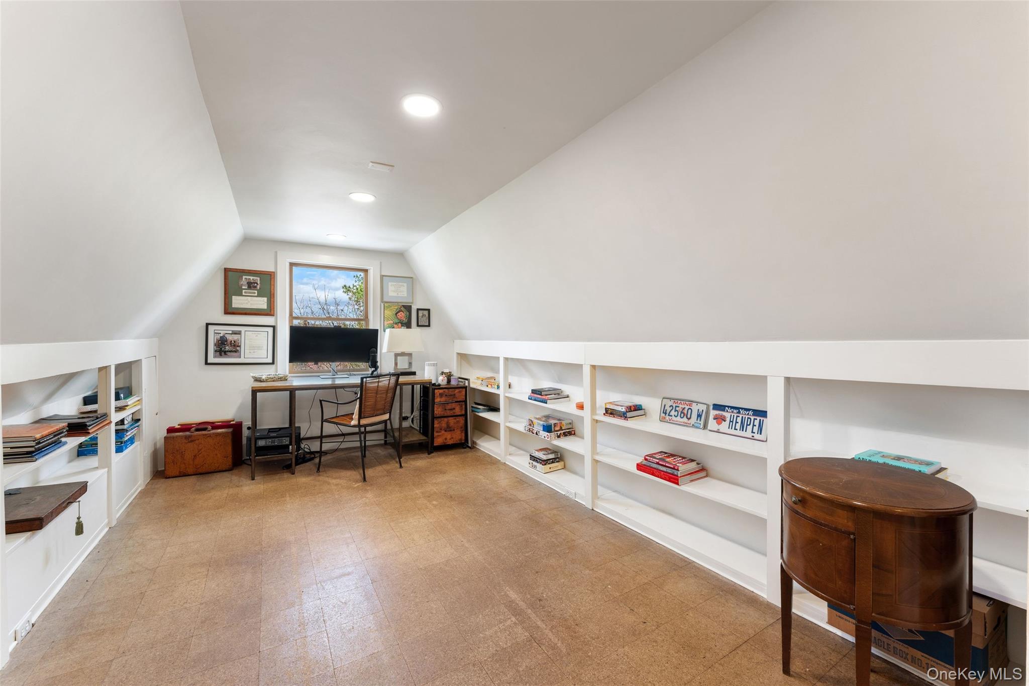 25 Merriam Avenue Bronxville, NY 10708 - Photo 17 of 26 a living room with furniture and a flat screen tv