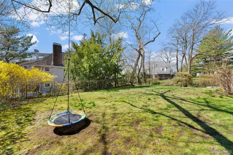 a view of a fountain in the yard