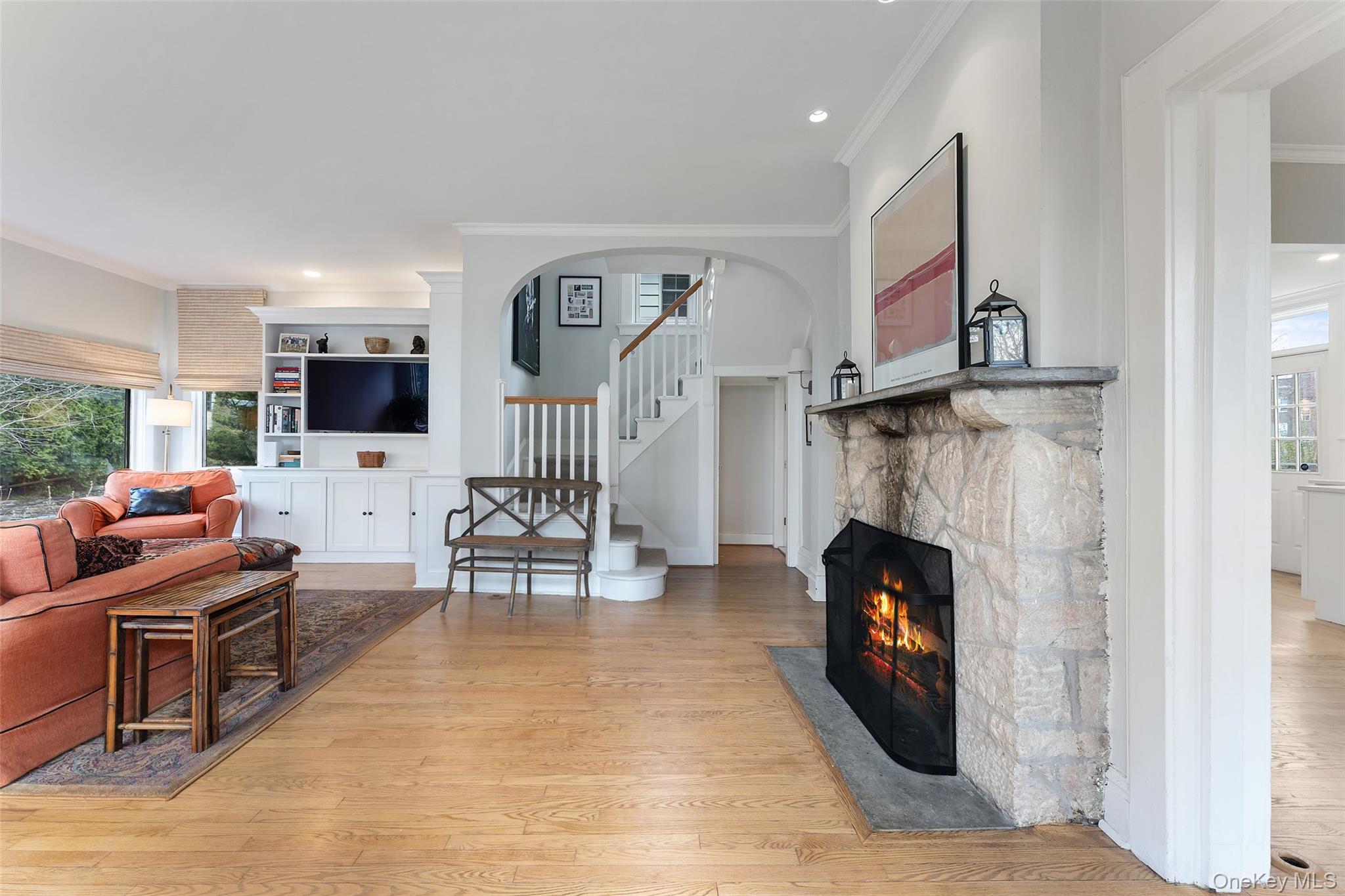 25 Merriam Avenue Bronxville, NY 10708 - Photo 2 of 26 a living room with furniture and a fireplace