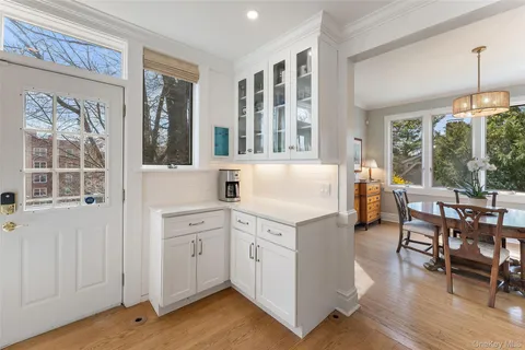 a view of living room with furniture and windows