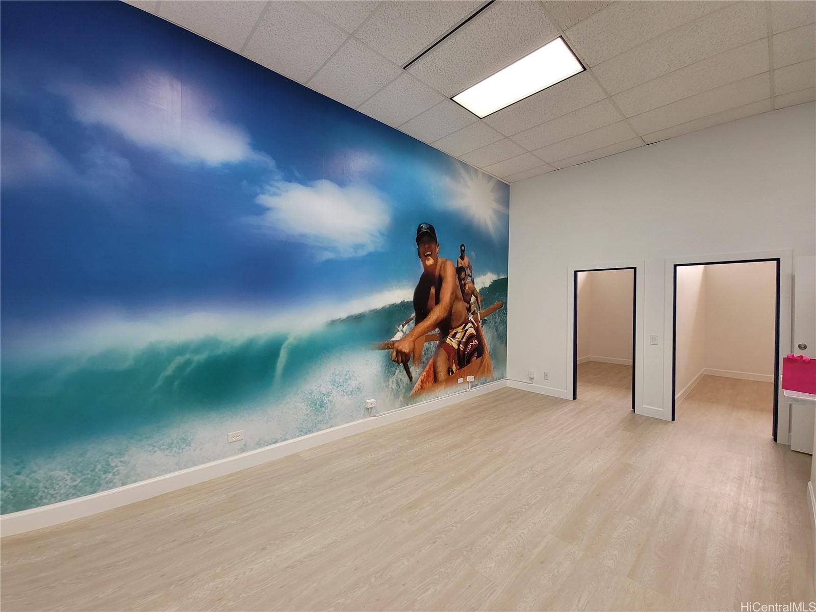 3615 Harding Avenue, Unit 102 Honolulu, HI 96816 - Photo 1 of 1 a view of a livingroom with a staircase