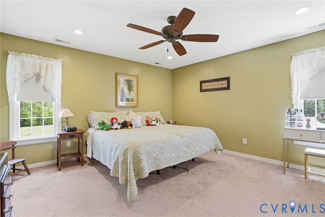 19012 Teman Road Beaverdam, VA 23015 - Photo 16 of 41 a bedroom with a bed and a table in it