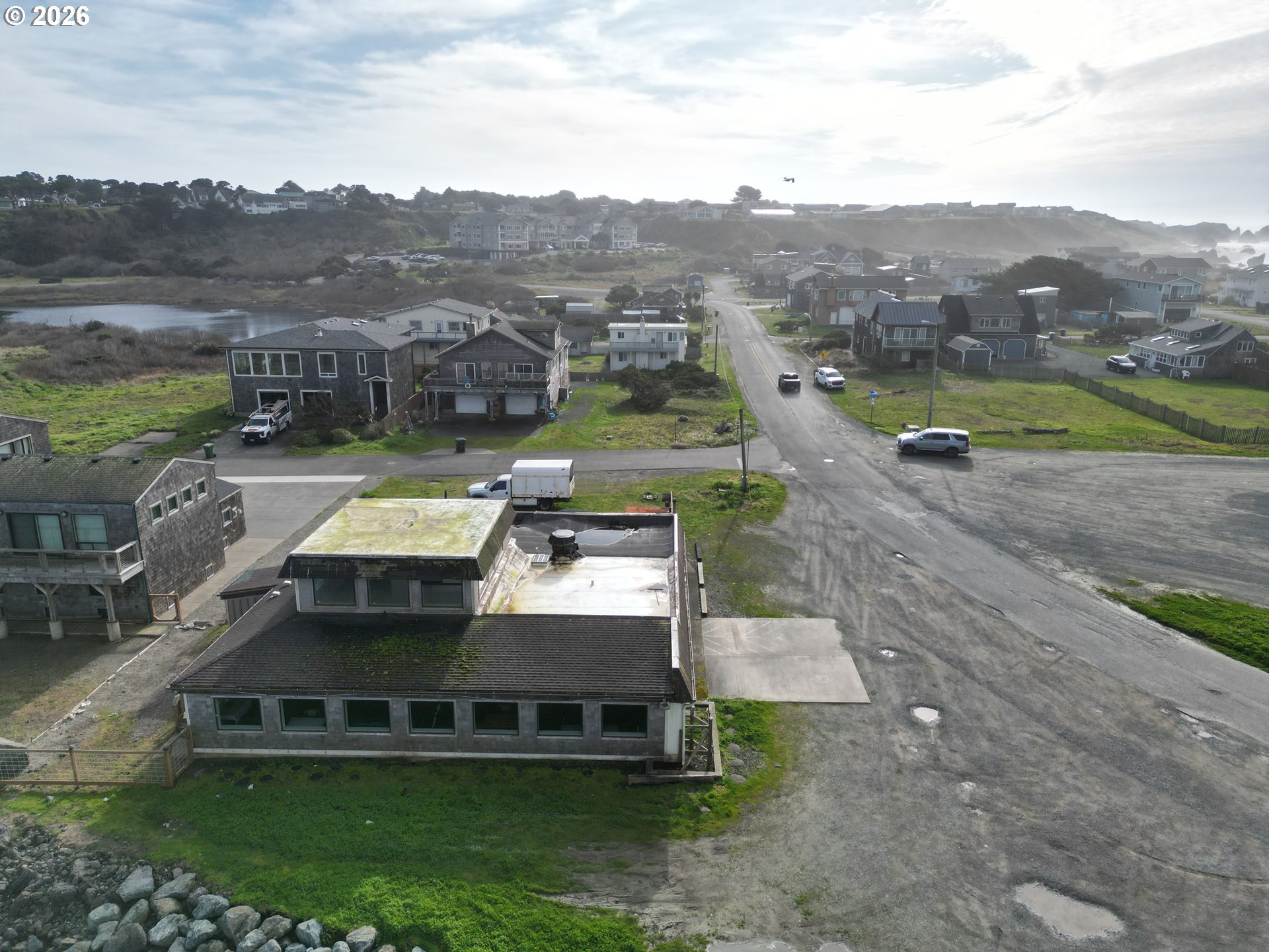 Secorner Lincoln 3rd Street Southwest Bandon, OR 97411 - Photo 10 of 10 a view of a house with a big yard