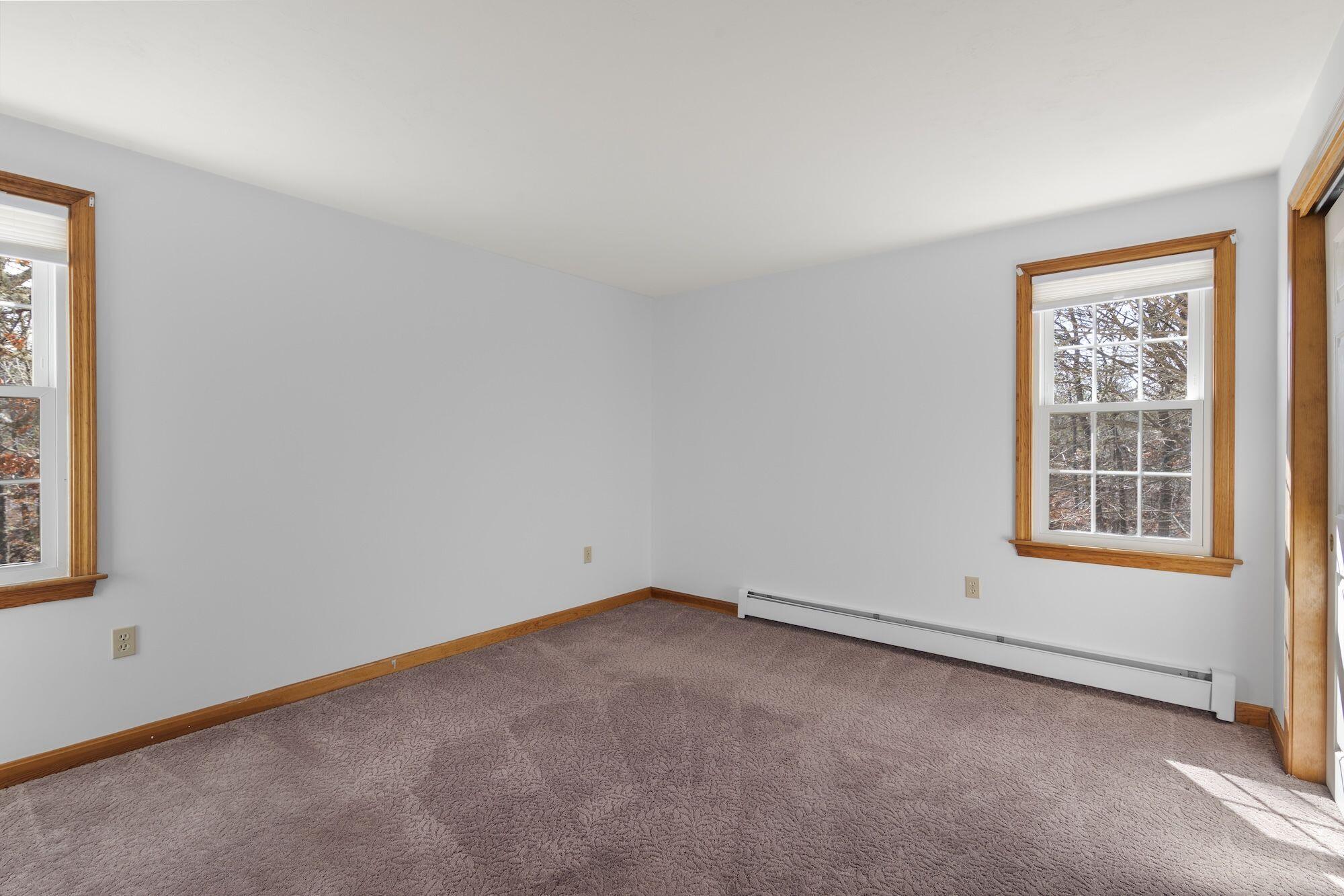 263 Spruce Road Harwich, MA 02645 - Photo 23 of 53 an empty room with a window