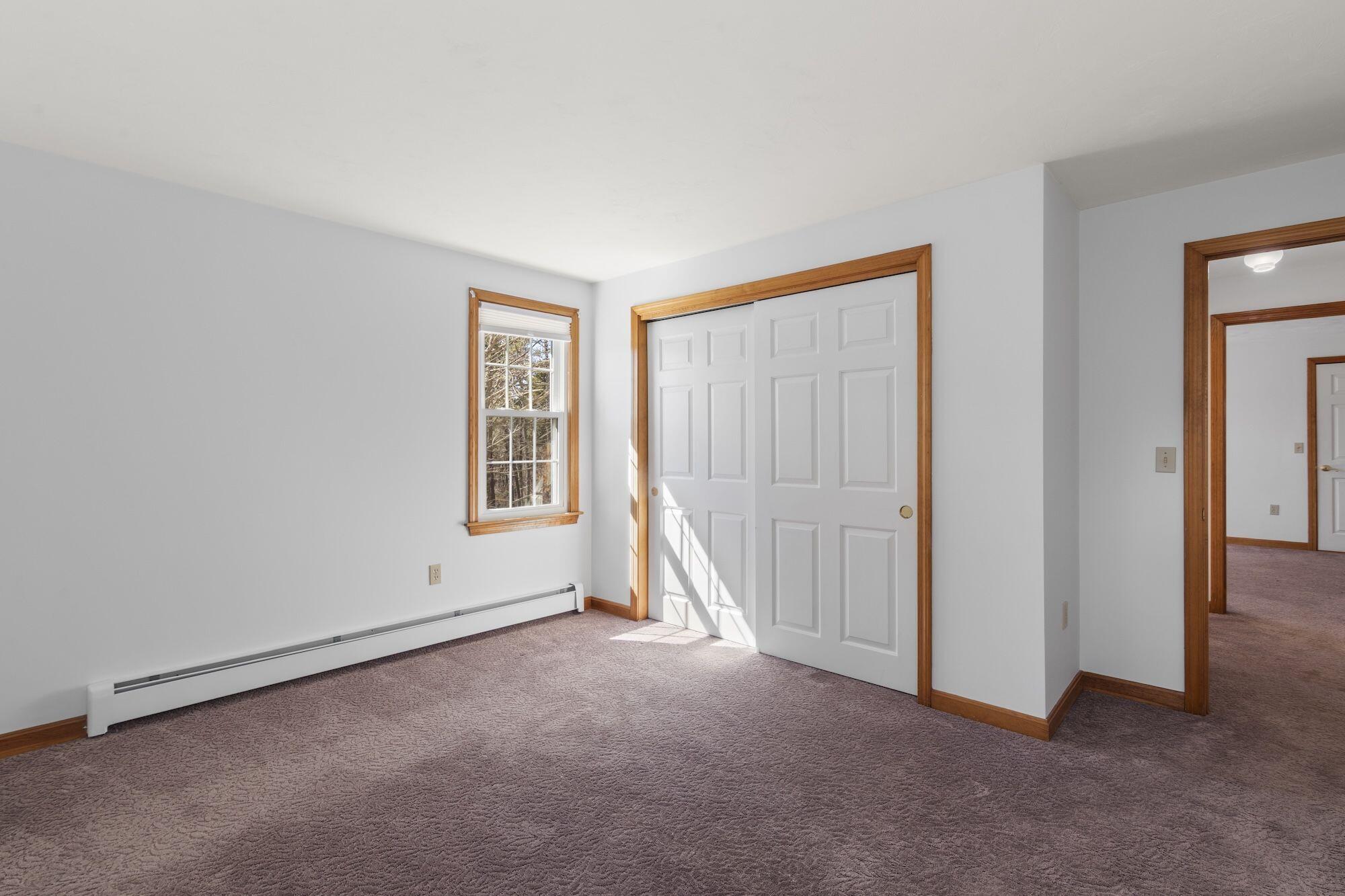 263 Spruce Road Harwich, MA 02645 - Photo 25 of 53 an empty room with a window