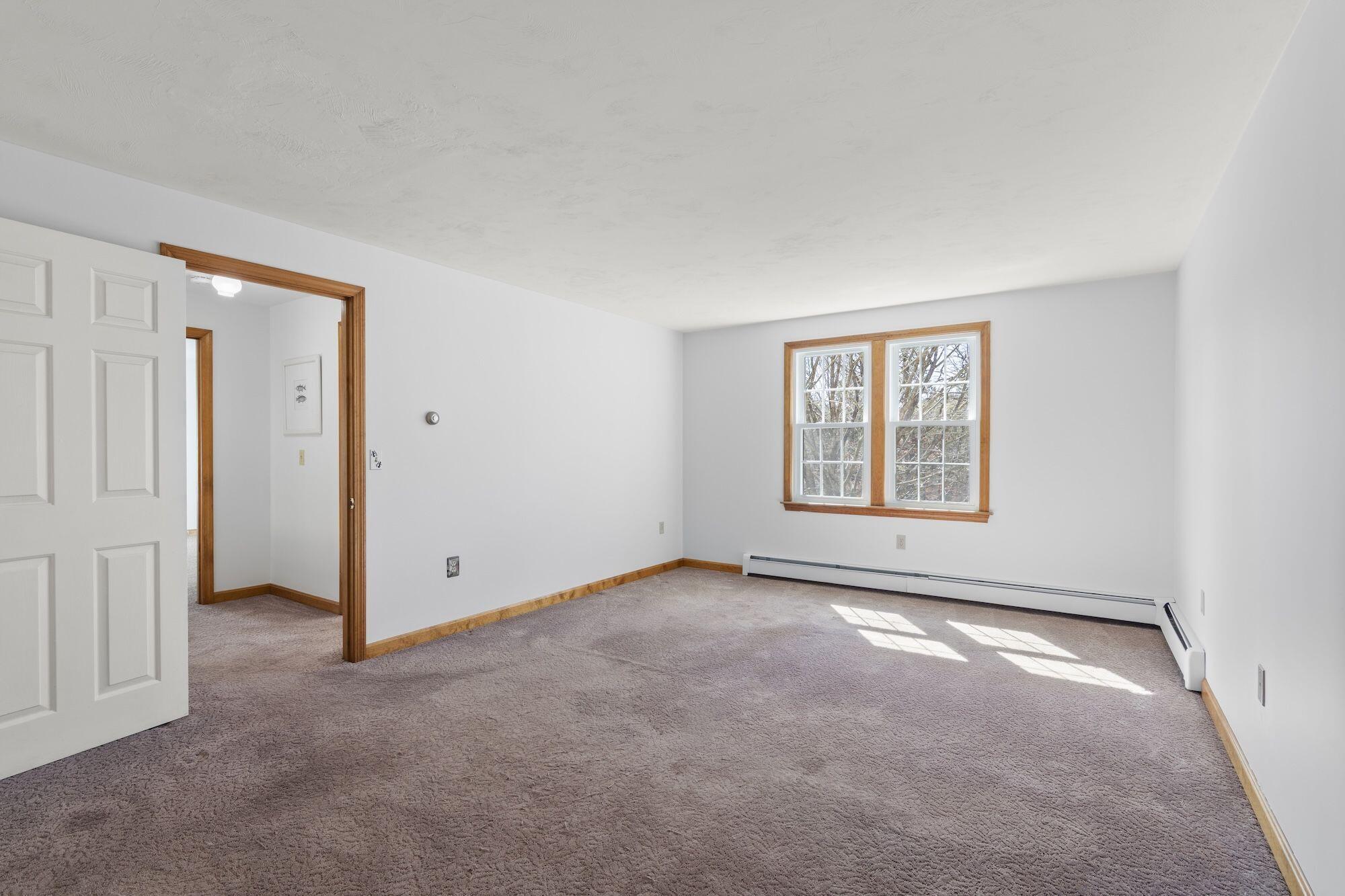 263 Spruce Road Harwich, MA 02645 - Photo 30 of 53 an empty room with windows
