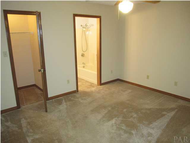 4240 Galt City Road Milton, FL 32583 - Photo 15 of 25 Master bedroom. Walk-in closet to your left, master bath to your right.