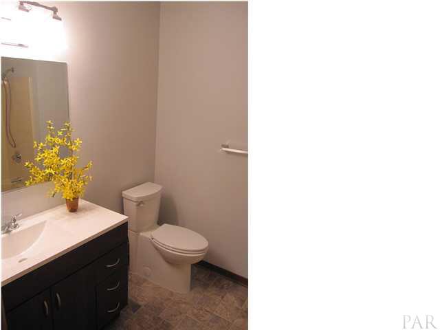 4240 Galt City Road Milton, FL 32583 - Photo 16 of 25 Master bath with stylish NEW vanity, lighting, toilet & flooring Feb. 2013
