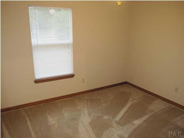 4240 Galt City Road Milton, FL 32583 - Photo 17 of 25 One of the 2 additional bedrooms. Both have lighted ceiling fans.