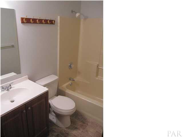 4240 Galt City Road Milton, FL 32583 - Photo 18 of 25 Additional bath with stylish NEW vanity, toilet, lighting & flooring Feb. 2013