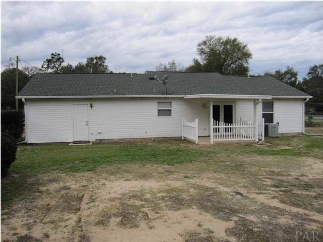4240 Galt City Road Milton, FL 32583 - Photo 20 of 25 Door to your left opens to the garage. Roof was shingled May 2005.