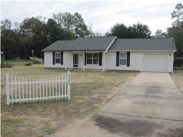 4240 Galt City Road Milton, FL 32583 - Photo 2 of 25 Relax on your 17 x 5 covered porch.