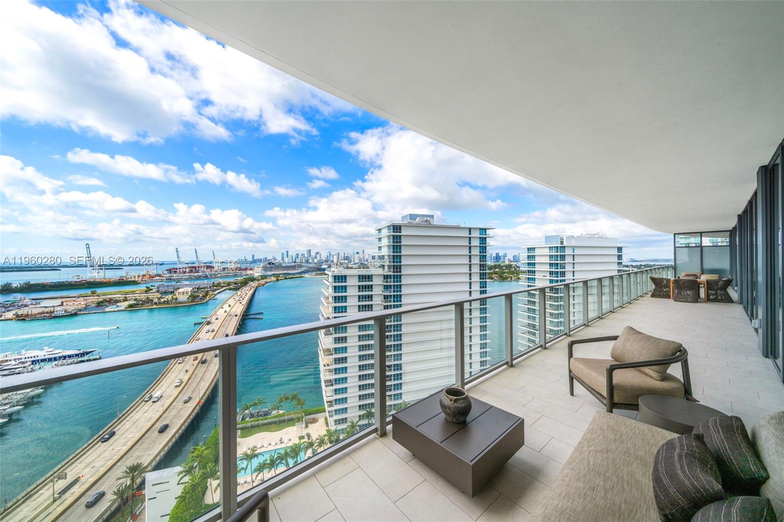 500 Alton Road, Unit 2203 Miami Beach, FL 33139 - Photo 13 of 36 a view of roof deck with seating space and barbeque oven