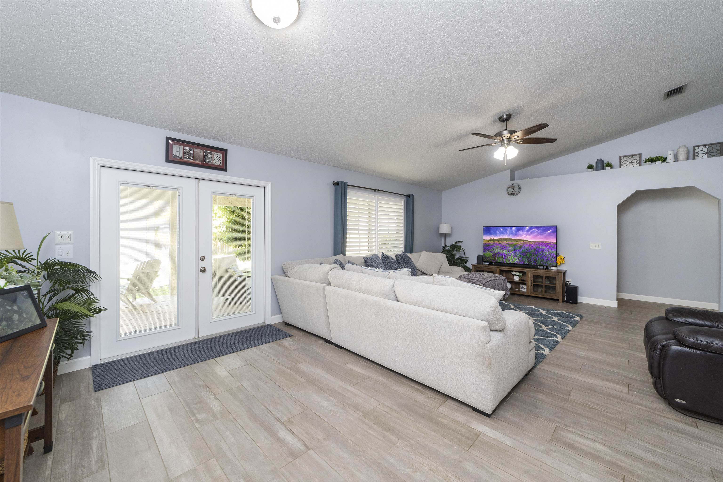 845 Wildwood Drive St. Augustine, FL 32086 - Photo 14 of 58 a living room with furniture and a flat screen tv