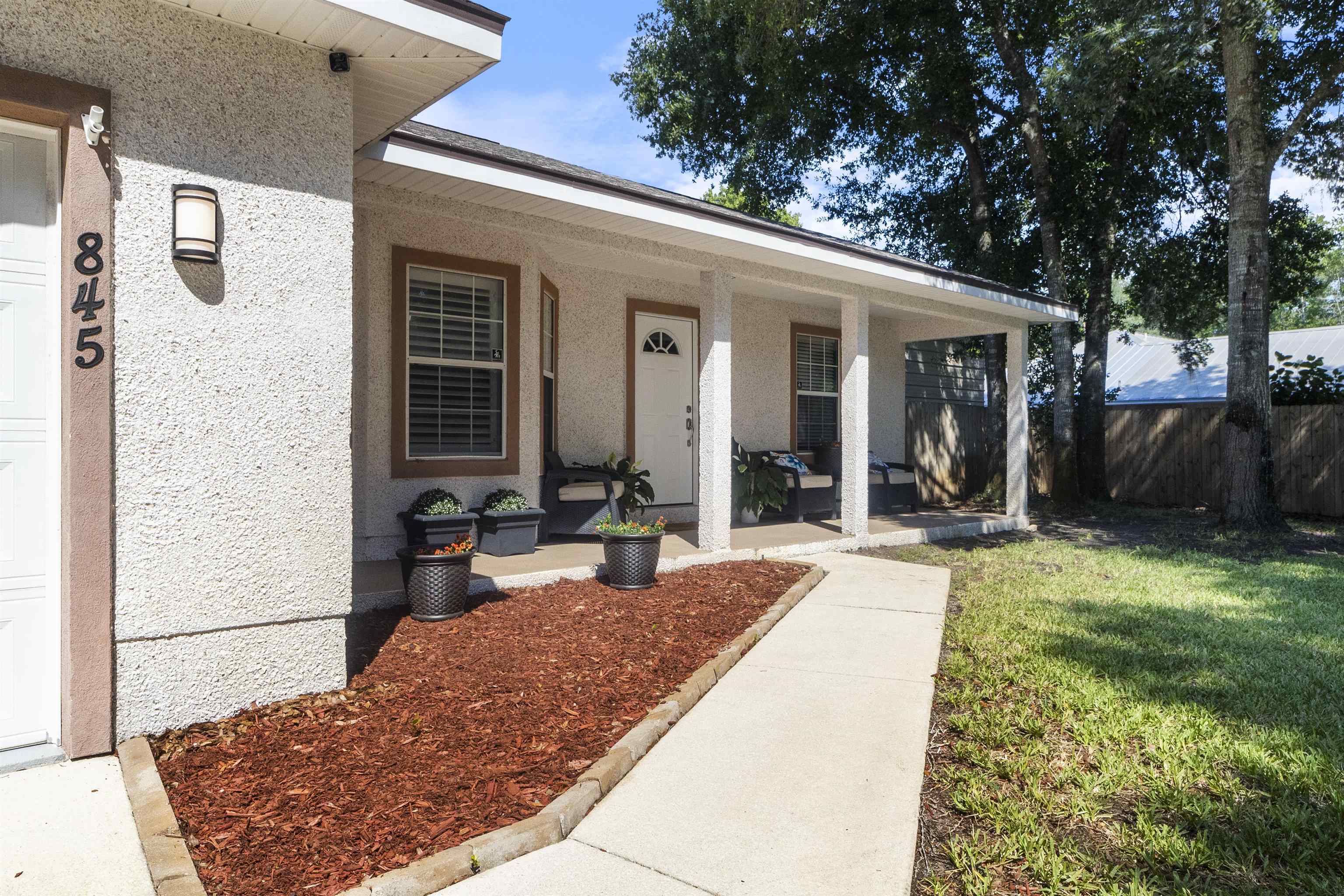 845 Wildwood Drive St. Augustine, FL 32086 - Photo 2 of 58 a view of house with yard