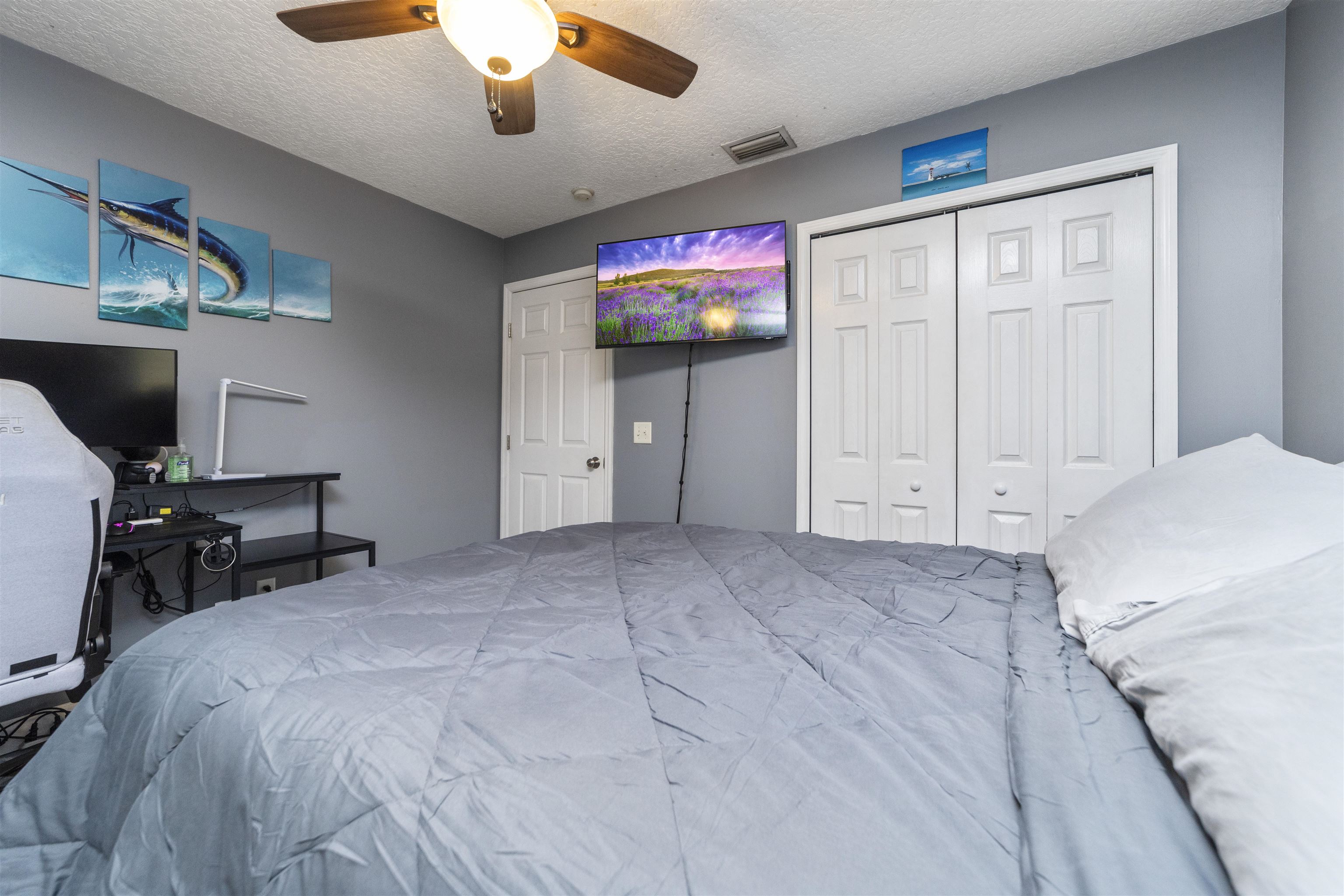 845 Wildwood Drive St. Augustine, FL 32086 - Photo 28 of 58 a view of a livingroom with furniture and a flat screen tv
