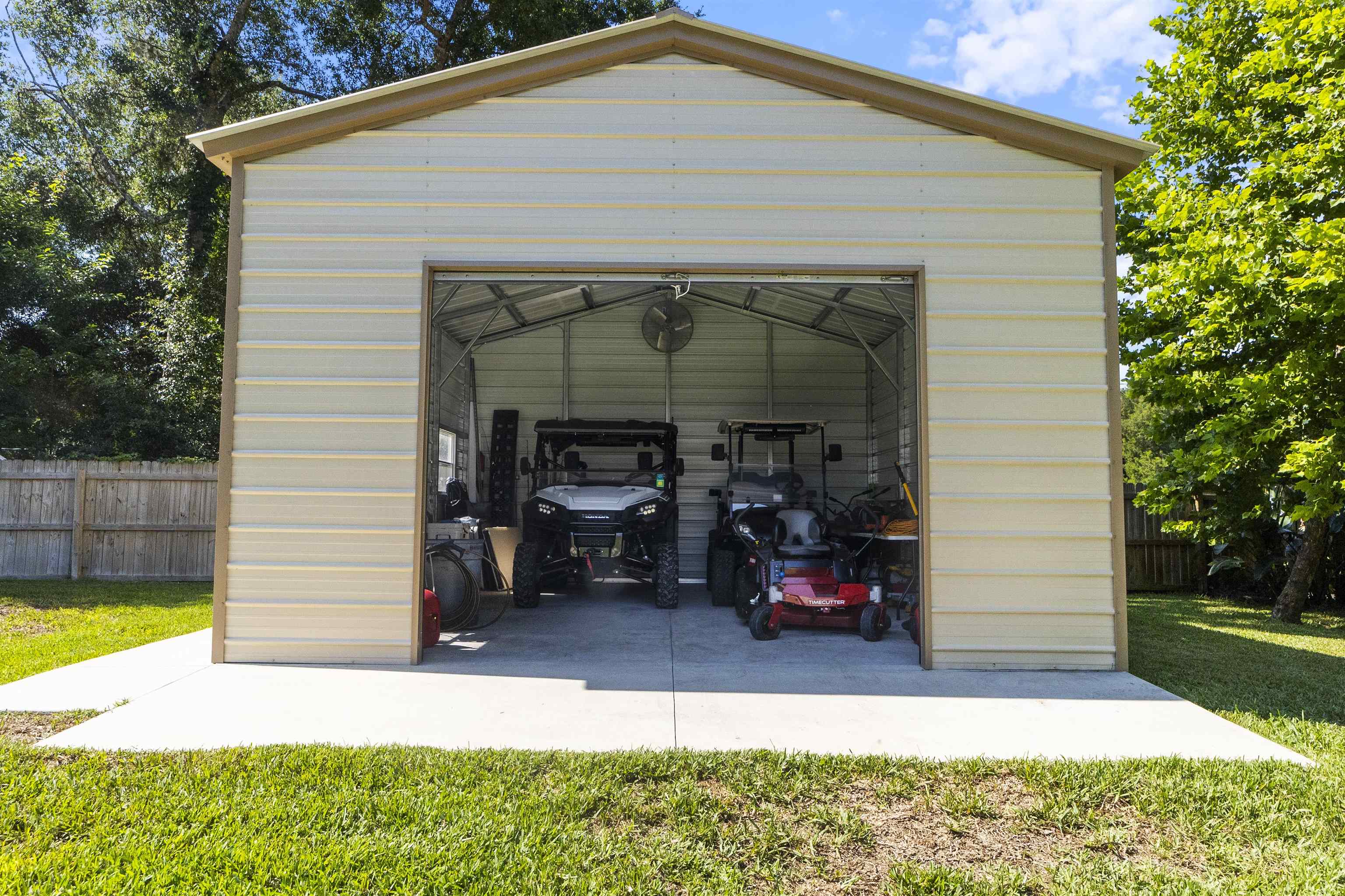 845 Wildwood Drive St. Augustine, FL 32086 - Photo 51 of 58 a front view of a house with a yard