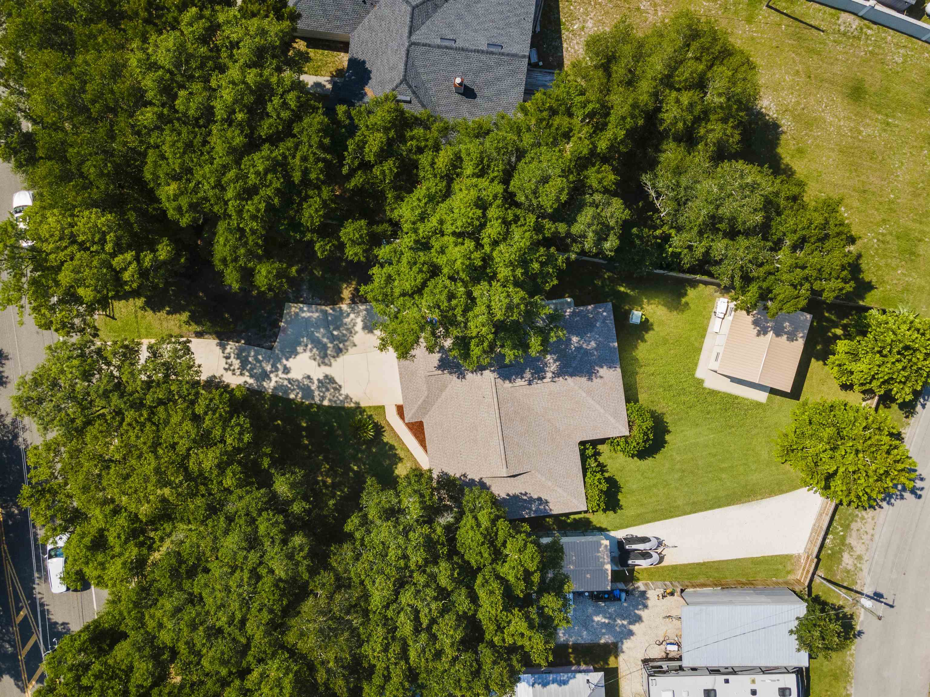 845 Wildwood Drive St. Augustine, FL 32086 - Photo 52 of 58 an aerial view of a house with a yard and swimming pool