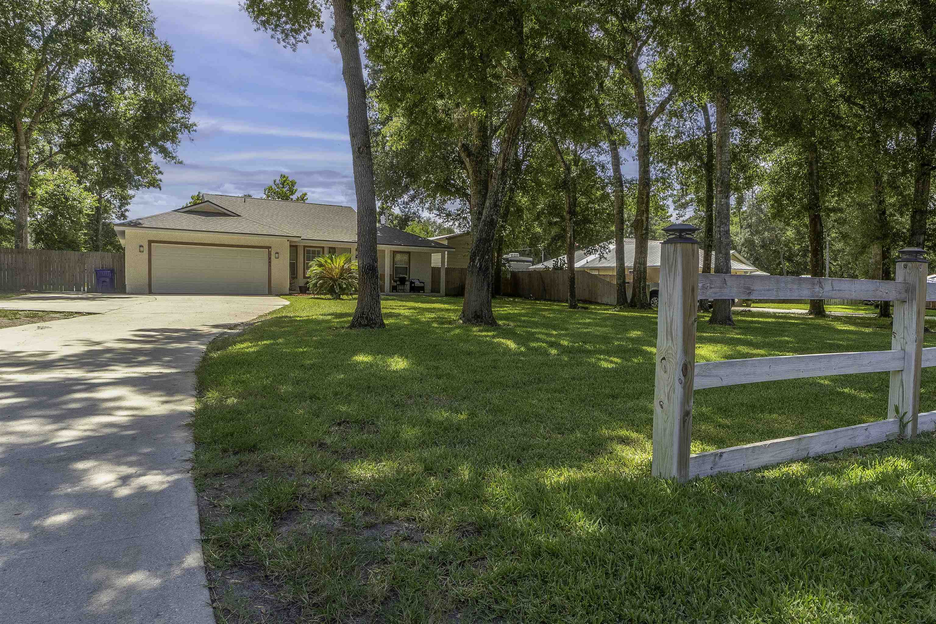 845 Wildwood Drive St. Augustine, FL 32086 - Photo 58 of 58 a view of a house with a yard and tree s
